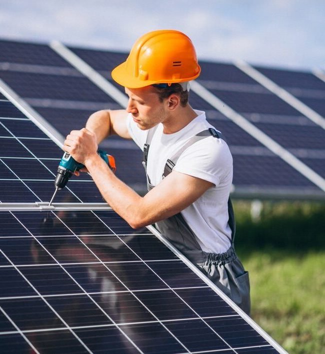 man-worker-firld-by-solar-panels_1303-15551